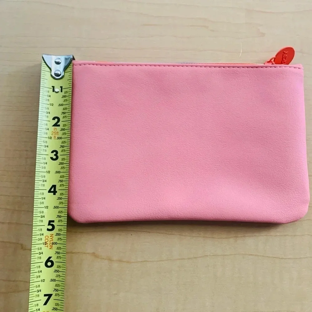 Like NEW IPSY comedic pouch